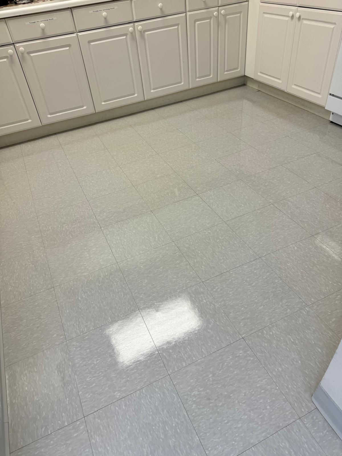 Kitchen VCT tile after stripping and waxing