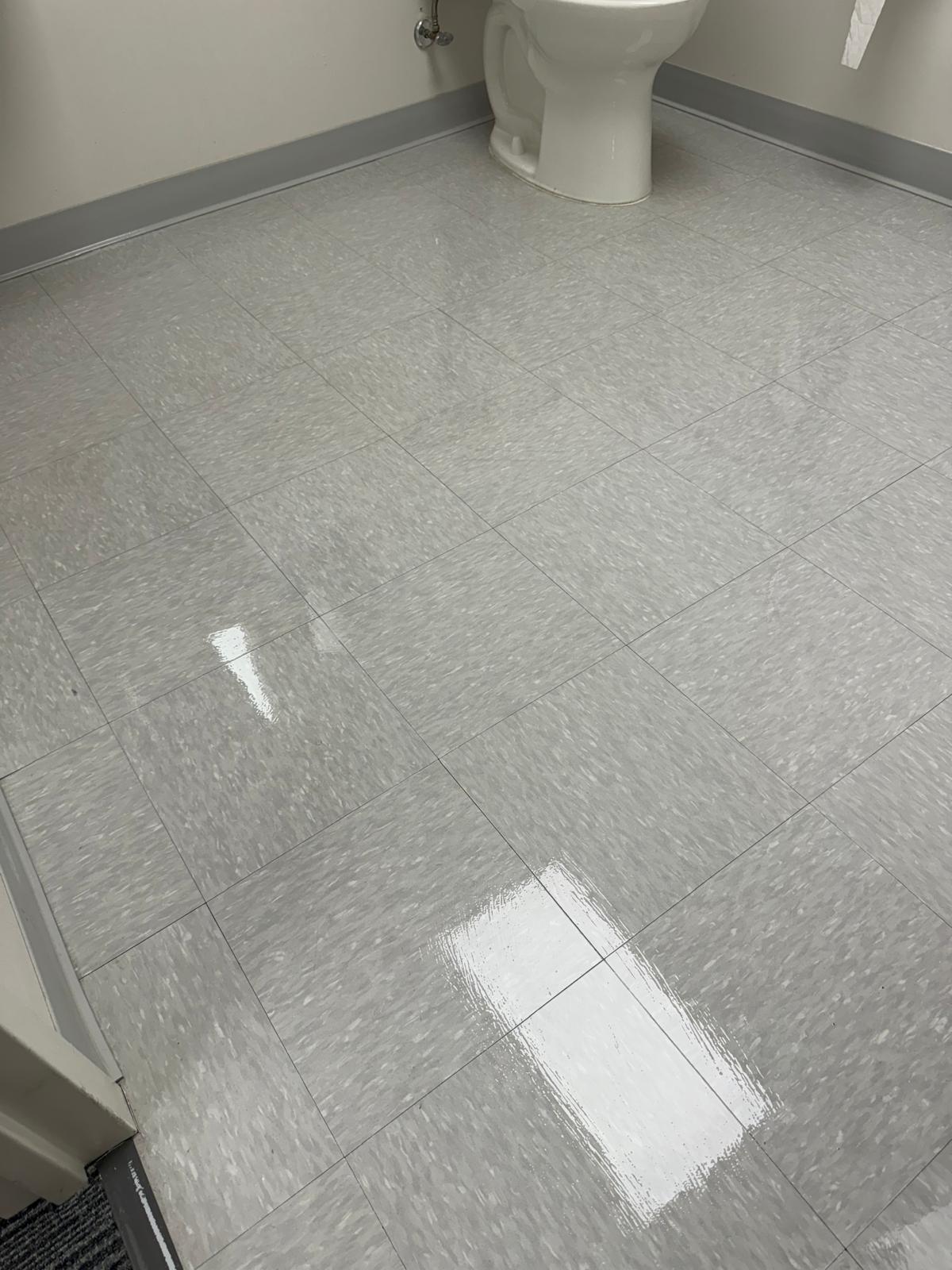 Restroom VCT tile after stripping and waxing