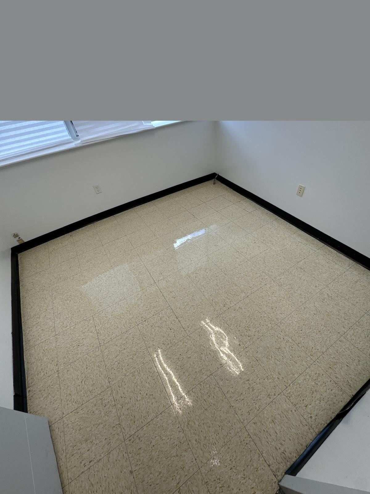 After - freshly waxed VCT tile with high gloss finish