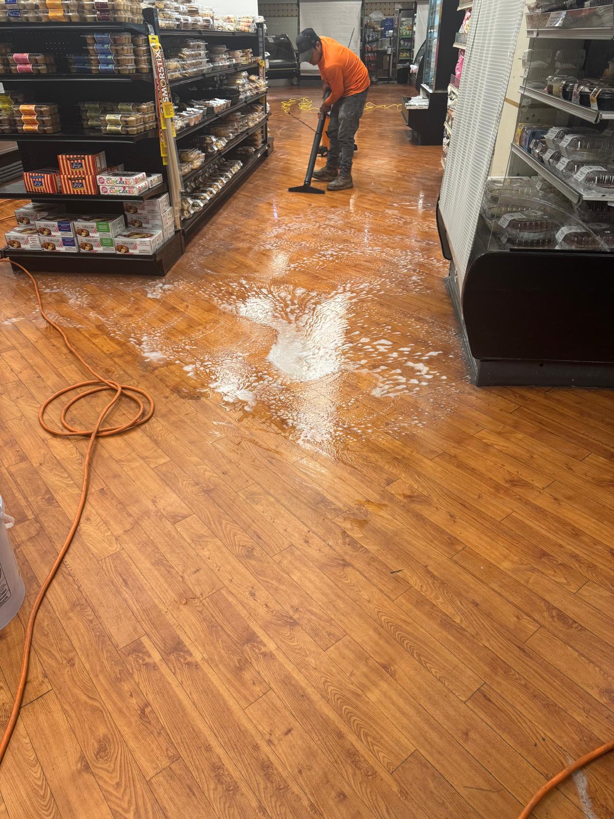 Final stripping pass on wood floor